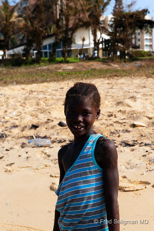 20090528_165424 D3 X1.jpg - Young girl at the beach.   Meridian Hotel in background